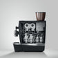 OBL2 Giga X8C Coffee machine with open lid showing internal components on a white background
