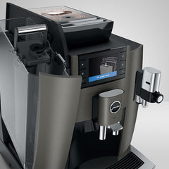 Angled OBS1 coffee machine with its removable water tank open