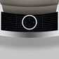 Close-up of OBM3  Jura X10 coffee machine front vent grille with silver circular ring on grey background